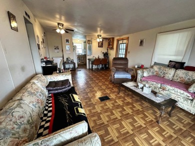 Welcome to your perfect retreat! This cozy 2 bedroom, 1 bathroom on Lake Henry Golf Club in Florida - for sale on GolfHomes.com, golf home, golf lot