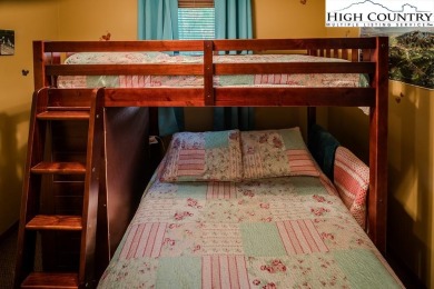 Cute Year Round Mountain Cabin.  Open floor plan with fantastic on Land Harbor Golf Course in North Carolina - for sale on GolfHomes.com, golf home, golf lot