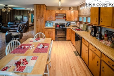 Cute Year Round Mountain Cabin.  Open floor plan with fantastic on Land Harbor Golf Course in North Carolina - for sale on GolfHomes.com, golf home, golf lot