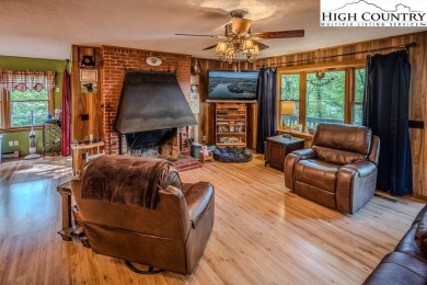 Cute Year Round Mountain Cabin.  Open floor plan with fantastic on Land Harbor Golf Course in North Carolina - for sale on GolfHomes.com, golf home, golf lot