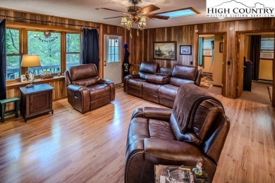 Cute Year Round Mountain Cabin.  Open floor plan with fantastic on Land Harbor Golf Course in North Carolina - for sale on GolfHomes.com, golf home, golf lot