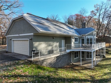 Timeless elegance abounds in this custom-built home nestled on 2 on Chippewa Valley Golf Club in Wisconsin - for sale on GolfHomes.com, golf home, golf lot