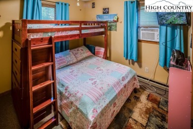 Cute Year Round Mountain Cabin.  Open floor plan with fantastic on Land Harbor Golf Course in North Carolina - for sale on GolfHomes.com, golf home, golf lot