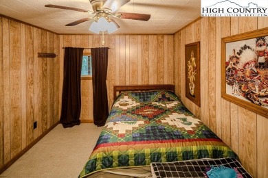 Cute Year Round Mountain Cabin.  Open floor plan with fantastic on Land Harbor Golf Course in North Carolina - for sale on GolfHomes.com, golf home, golf lot
