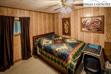 Cute Year Round Mountain Cabin.  Open floor plan with fantastic on Land Harbor Golf Course in North Carolina - for sale on GolfHomes.com, golf home, golf lot