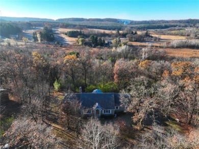 Timeless elegance abounds in this custom-built home nestled on 2 on Chippewa Valley Golf Club in Wisconsin - for sale on GolfHomes.com, golf home, golf lot