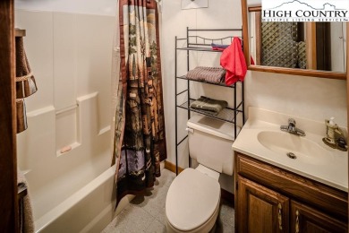 Cute Year Round Mountain Cabin.  Open floor plan with fantastic on Land Harbor Golf Course in North Carolina - for sale on GolfHomes.com, golf home, golf lot