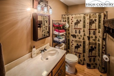 Cute Year Round Mountain Cabin.  Open floor plan with fantastic on Land Harbor Golf Course in North Carolina - for sale on GolfHomes.com, golf home, golf lot