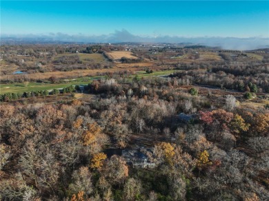 Timeless elegance abounds in this custom-built home nestled on 2 on Chippewa Valley Golf Club in Wisconsin - for sale on GolfHomes.com, golf home, golf lot