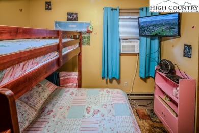Cute Year Round Mountain Cabin.  Open floor plan with fantastic on Land Harbor Golf Course in North Carolina - for sale on GolfHomes.com, golf home, golf lot