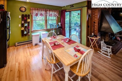Cute Year Round Mountain Cabin.  Open floor plan with fantastic on Land Harbor Golf Course in North Carolina - for sale on GolfHomes.com, golf home, golf lot