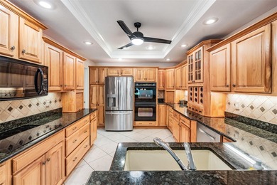 One or more photo(s) has been virtually staged. Location on Tampa Bay Golf and Country Club in Florida - for sale on GolfHomes.com, golf home, golf lot