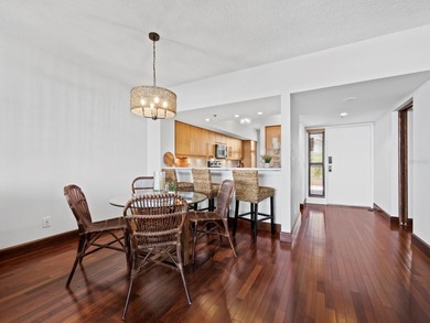 Sweeping bay views and refined comfort define this beautifully on Longboat Key Golf Club Resort in Florida - for sale on GolfHomes.com, golf home, golf lot