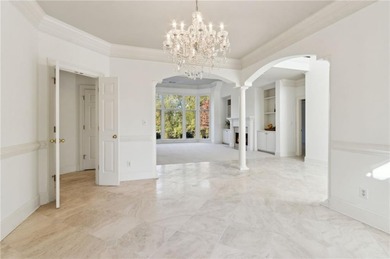 Welcome to your dream home nestled in the breathtaking community on Atlanta Athletic Club in Georgia - for sale on GolfHomes.com, golf home, golf lot