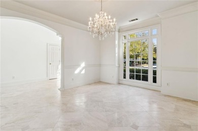 Welcome to your dream home nestled in the breathtaking community on Atlanta Athletic Club in Georgia - for sale on GolfHomes.com, golf home, golf lot