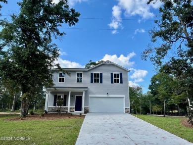 Welcome to Village Green, Logan Homes NEWEST community in on Brick Landing Plantation Yacht and Golf Club in North Carolina - for sale on GolfHomes.com, golf home, golf lot