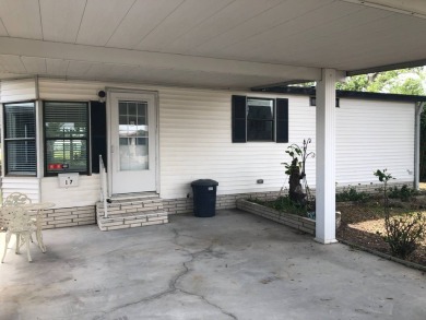 Stunning 2 Bed / 2 Bath Remodeled Home with Gorgeous Water Views on The Meadows At Countrywood in Florida - for sale on GolfHomes.com, golf home, golf lot