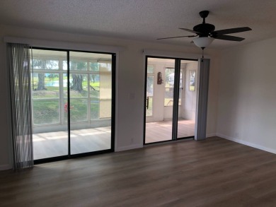 Stunning 2 Bed / 2 Bath Remodeled Home with Gorgeous Water Views on The Meadows At Countrywood in Florida - for sale on GolfHomes.com, golf home, golf lot