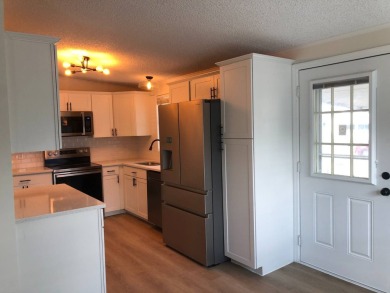 Stunning 2 Bed / 2 Bath Remodeled Home with Gorgeous Water Views on The Meadows At Countrywood in Florida - for sale on GolfHomes.com, golf home, golf lot