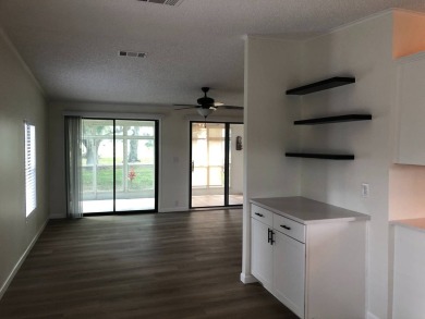 Stunning 2 Bed / 2 Bath Remodeled Home with Gorgeous Water Views on The Meadows At Countrywood in Florida - for sale on GolfHomes.com, golf home, golf lot
