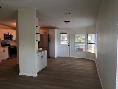 Stunning 2 Bed / 2 Bath Remodeled Home with Gorgeous Water Views on The Meadows At Countrywood in Florida - for sale on GolfHomes.com, golf home, golf lot