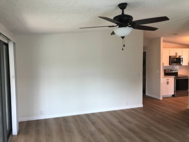 Stunning 2 Bed / 2 Bath Remodeled Home with Gorgeous Water Views on The Meadows At Countrywood in Florida - for sale on GolfHomes.com, golf home, golf lot
