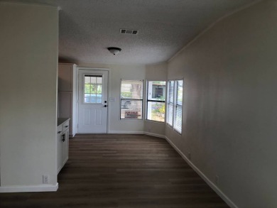 Stunning 2 Bed / 2 Bath Remodeled Home with Gorgeous Water Views on The Meadows At Countrywood in Florida - for sale on GolfHomes.com, golf home, golf lot