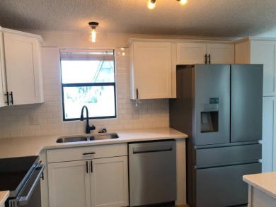 Stunning 2 Bed / 2 Bath Remodeled Home with Gorgeous Water Views on The Meadows At Countrywood in Florida - for sale on GolfHomes.com, golf home, golf lot