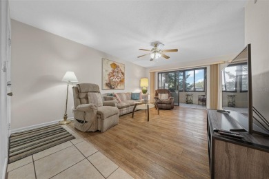 Lake Sparkle 55+ FURNISHED LAKEFRONT 1st FLOOR Condominium on Country Club At Silver Springs Shores in Florida - for sale on GolfHomes.com, golf home, golf lot