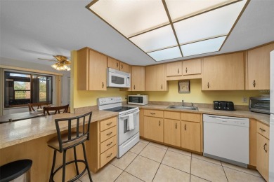 Lake Sparkle 55+ FURNISHED LAKEFRONT 1st FLOOR Condominium on Country Club At Silver Springs Shores in Florida - for sale on GolfHomes.com, golf home, golf lot