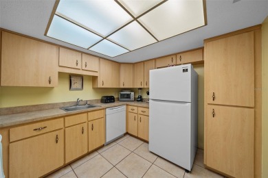 Lake Sparkle 55+ FURNISHED LAKEFRONT 1st FLOOR Condominium on Country Club At Silver Springs Shores in Florida - for sale on GolfHomes.com, golf home, golf lot