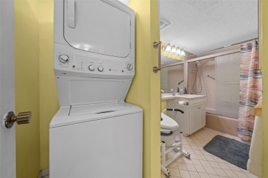 Lake Sparkle 55+ FURNISHED LAKEFRONT 1st FLOOR Condominium on Country Club At Silver Springs Shores in Florida - for sale on GolfHomes.com, golf home, golf lot