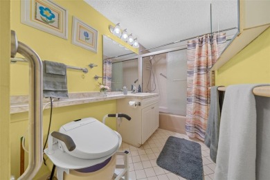 Lake Sparkle 55+ FURNISHED LAKEFRONT 1st FLOOR Condominium on Country Club At Silver Springs Shores in Florida - for sale on GolfHomes.com, golf home, golf lot