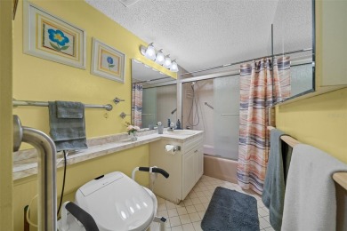 Lake Sparkle 55+ FURNISHED LAKEFRONT 1st FLOOR Condominium on Country Club At Silver Springs Shores in Florida - for sale on GolfHomes.com, golf home, golf lot