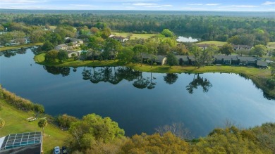 Lake Sparkle 55+ FURNISHED LAKEFRONT 1st FLOOR Condominium on Country Club At Silver Springs Shores in Florida - for sale on GolfHomes.com, golf home, golf lot