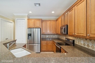 CHECK OUT THIS SPECTACCULAR GOLF VIEW!This townhouse is located on The Legacy Golf and Tennis Club in Florida - for sale on GolfHomes.com, golf home, golf lot