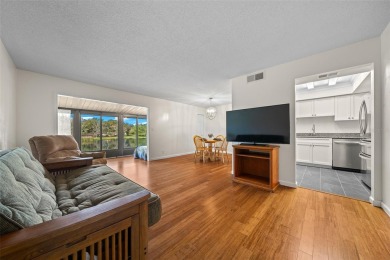 Lake Sparkle 55+ Partially FURNISHED LAKEFRONT Condominium on Country Club At Silver Springs Shores in Florida - for sale on GolfHomes.com, golf home, golf lot