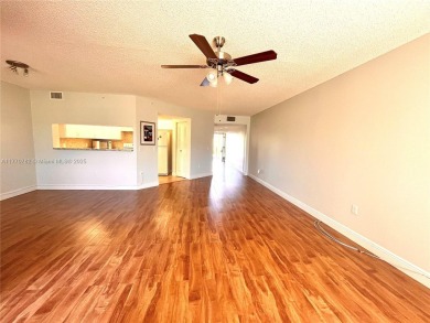 IMPECCABLE UNIT IN THE HEART OF PEMBROKE PINES, RESORT STYLE!! on Flamingo Lakes Country Club in Florida - for sale on GolfHomes.com, golf home, golf lot