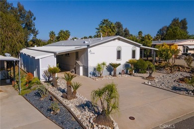 Charming golf course home located in the Canyon Lake Mobile on Canyon Lake Country Club in California - for sale on GolfHomes.com, golf home, golf lot