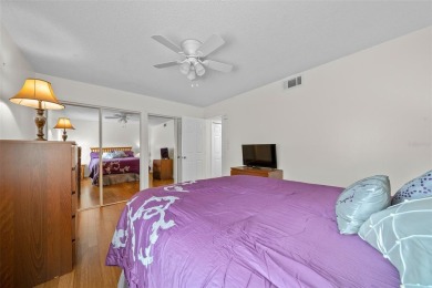 Lake Sparkle 55+ Partially FURNISHED LAKEFRONT Condominium on Country Club At Silver Springs Shores in Florida - for sale on GolfHomes.com, golf home, golf lot