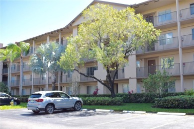 IMPECCABLE UNIT IN THE HEART OF PEMBROKE PINES, RESORT STYLE!! on Flamingo Lakes Country Club in Florida - for sale on GolfHomes.com, golf home, golf lot