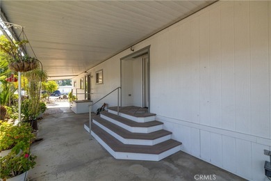 Charming golf course home located in the Canyon Lake Mobile on Canyon Lake Country Club in California - for sale on GolfHomes.com, golf home, golf lot