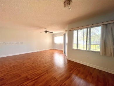 IMPECCABLE UNIT IN THE HEART OF PEMBROKE PINES, RESORT STYLE!! on Flamingo Lakes Country Club in Florida - for sale on GolfHomes.com, golf home, golf lot