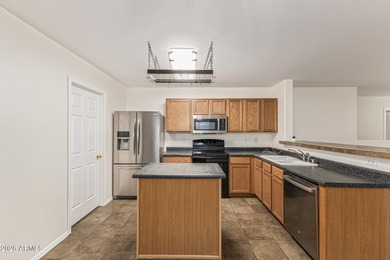 This move-in ready home in Johnson Ranch has been carefully on The Golf Club At Johnson Ranch in Arizona - for sale on GolfHomes.com, golf home, golf lot