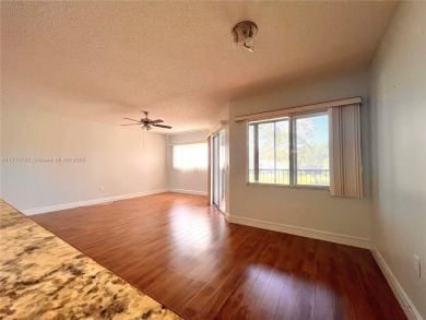 IMPECCABLE UNIT IN THE HEART OF PEMBROKE PINES, RESORT STYLE!! on Flamingo Lakes Country Club in Florida - for sale on GolfHomes.com, golf home, golf lot