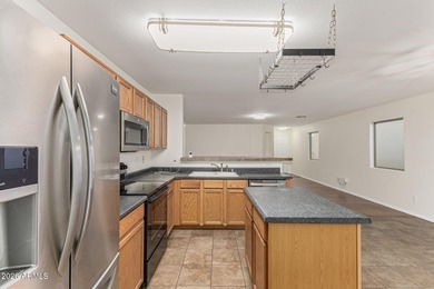 This move-in ready home in Johnson Ranch has been carefully on The Golf Club At Johnson Ranch in Arizona - for sale on GolfHomes.com, golf home, golf lot