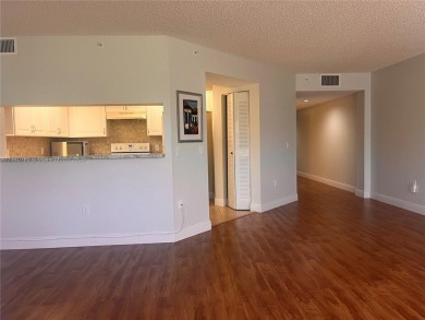 IMPECCABLE UNIT IN THE HEART OF PEMBROKE PINES, RESORT STYLE!! on Flamingo Lakes Country Club in Florida - for sale on GolfHomes.com, golf home, golf lot