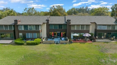 Lake Sparkle 55+ Partially FURNISHED LAKEFRONT Condominium on Country Club At Silver Springs Shores in Florida - for sale on GolfHomes.com, golf home, golf lot