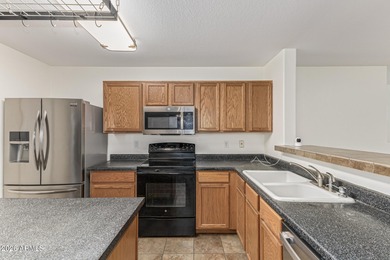 This move-in ready home in Johnson Ranch has been carefully on The Golf Club At Johnson Ranch in Arizona - for sale on GolfHomes.com, golf home, golf lot