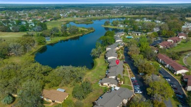 Lake Sparkle 55+ Partially FURNISHED LAKEFRONT Condominium on Country Club At Silver Springs Shores in Florida - for sale on GolfHomes.com, golf home, golf lot